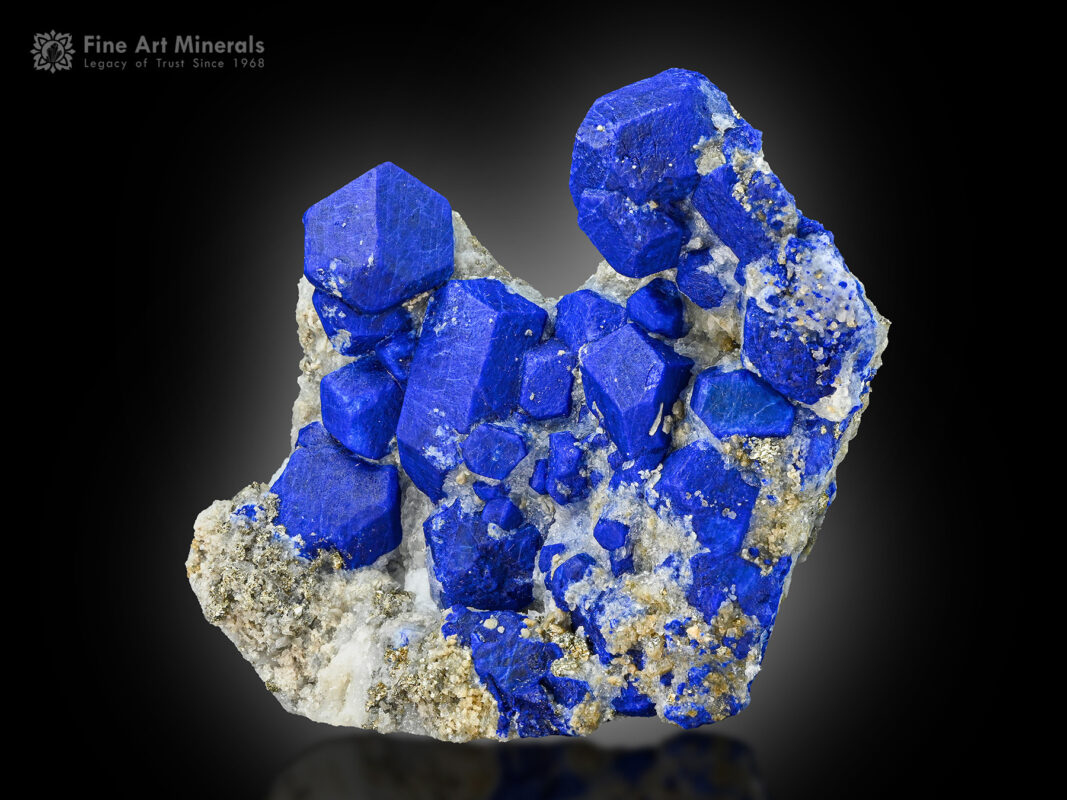 Lazurite cluster on Matrix from Ladjuar Medam, Sar-e-Sang, Kuran wa Munjan District, Badakhshan, Afghanistan.